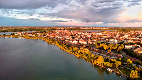 High angle view of river amidst buildings in city