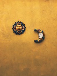 High angle view of woman sitting on wall