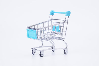 Side view of metallic structure against white background