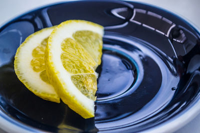 High angle view of lemon slices in plate