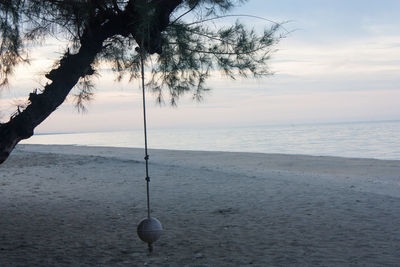 Scenic view of sea against sky at sunset