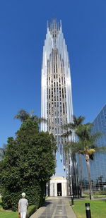 Low angle view of buildings against blue sky