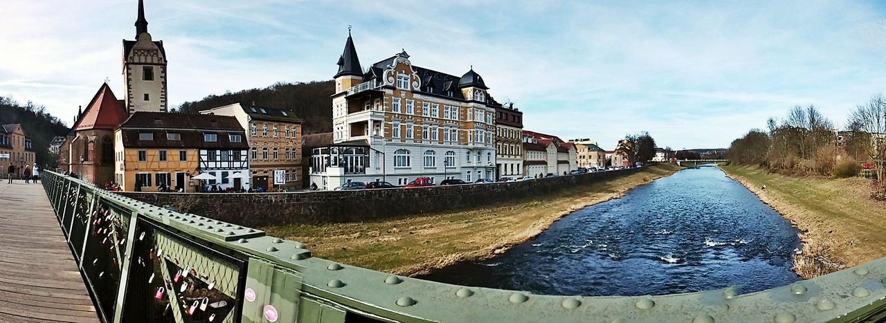 building exterior, architecture, built structure, water, sky, canal, cloud - sky, residential structure, city, house, transportation, residential building, cloud, river, building, day, outdoors, incidental people, panoramic, cloudy