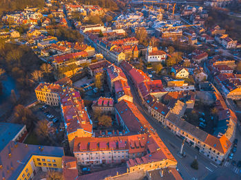 High angle view of illuminated buildings in city