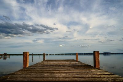 Pier over sea against sky