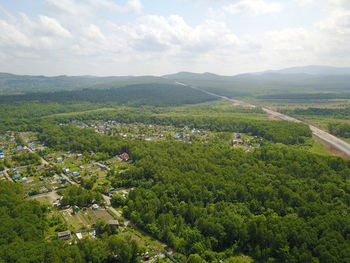 High angle view of trees on field against sky