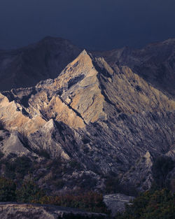 Scenic view of mountain range against sky