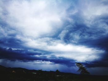 Storm clouds over landscape