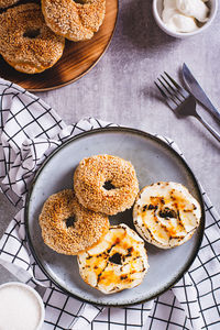 Sweet creme brulee bagels with cream cheese and caramelized sugar for breakfast top and vertical 