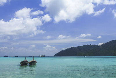 Longtail boats park in the sea at surin islands national park, phang nga, thailand.