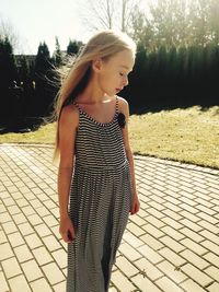 Full length of woman standing outdoors