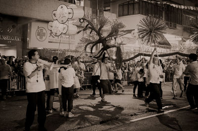 People walking on street in city