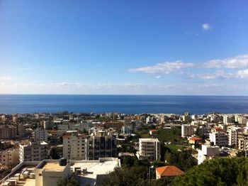 Cityscape against blue sky