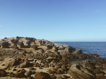 Scenic view of sea against clear sky