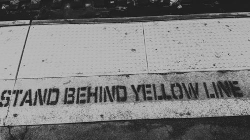 High angle view of text on street