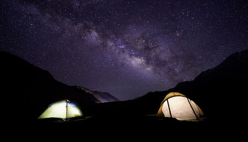 Scenic view of illuminated star field against sky at night