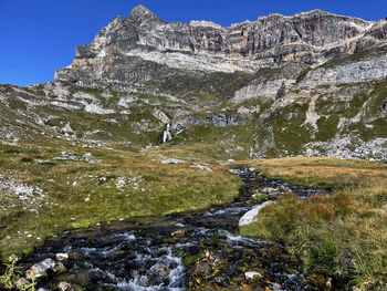 Glacial river and trails in vanoise national park, hautes alps, france