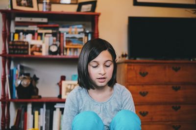 Girl in living room at home