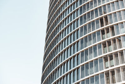 Low angle view of modern building against clear sky