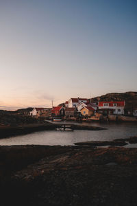 Scenic view of sea against clear sky during sunset