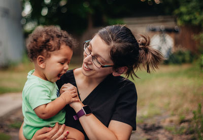 Mother and daughter outdoors