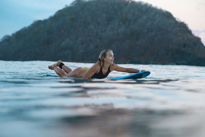 Woman relaxing in water