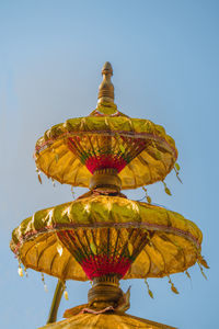 Low angle view of sculpture against clear sky