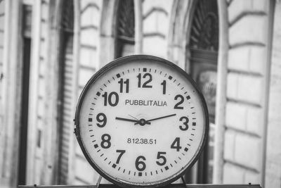 Close-up of clock on wall