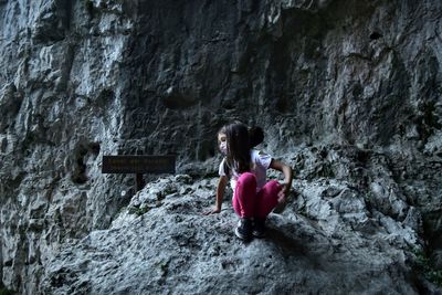 Portrait of girl on rock