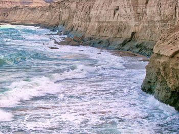 High angle view of rocks in sea