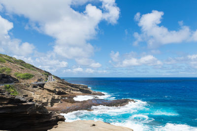 Scenic view of sea against blue sky