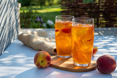 Fruits in glass on table