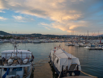 Boats moored at harbor