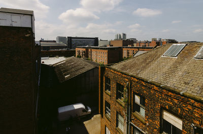 High angle view of residential buildings against sky