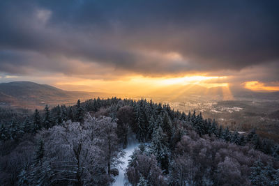 The warm light of the setting sun illuminates the murg valley in the wintry northern black forest