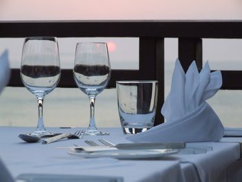 Drinking glasses on table in restaurant