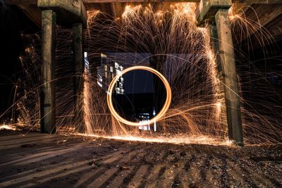 Wire wool at beach during night