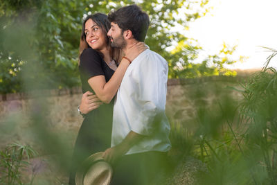 Couple standing outdoors