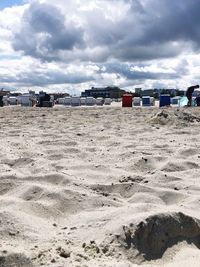 View of beach against cloudy sky