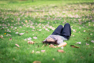 Woman lying on grass