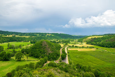 View of the chain of auvergne volcanoes under a thunderstorm