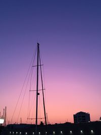 Silhouette of building against sky during sunset