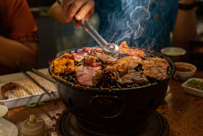 Close-up of person preparing food