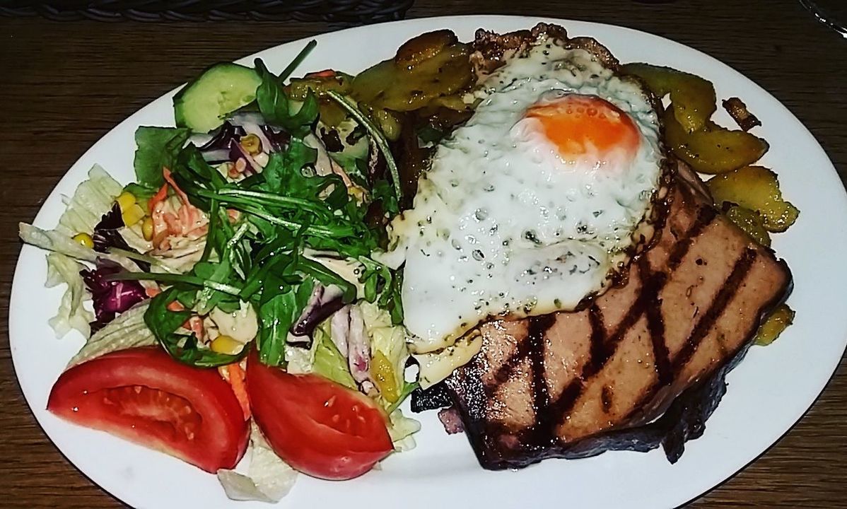 CLOSE-UP OF SERVED FOOD IN PLATE WITH FORK