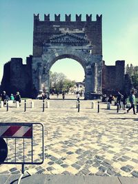 Group of people in front of historical building