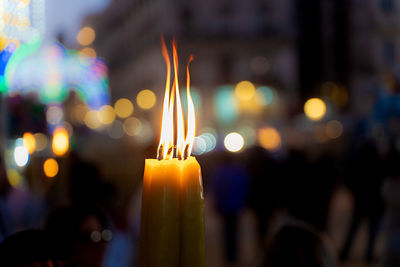 Close-up of illuminated candle