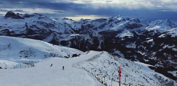 Scenic view of snow covered mountains