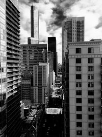 Buildings in city against sky