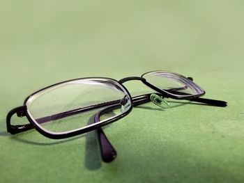 Close-up of eyeglasses on table