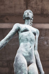 Low angle view of statue against sky